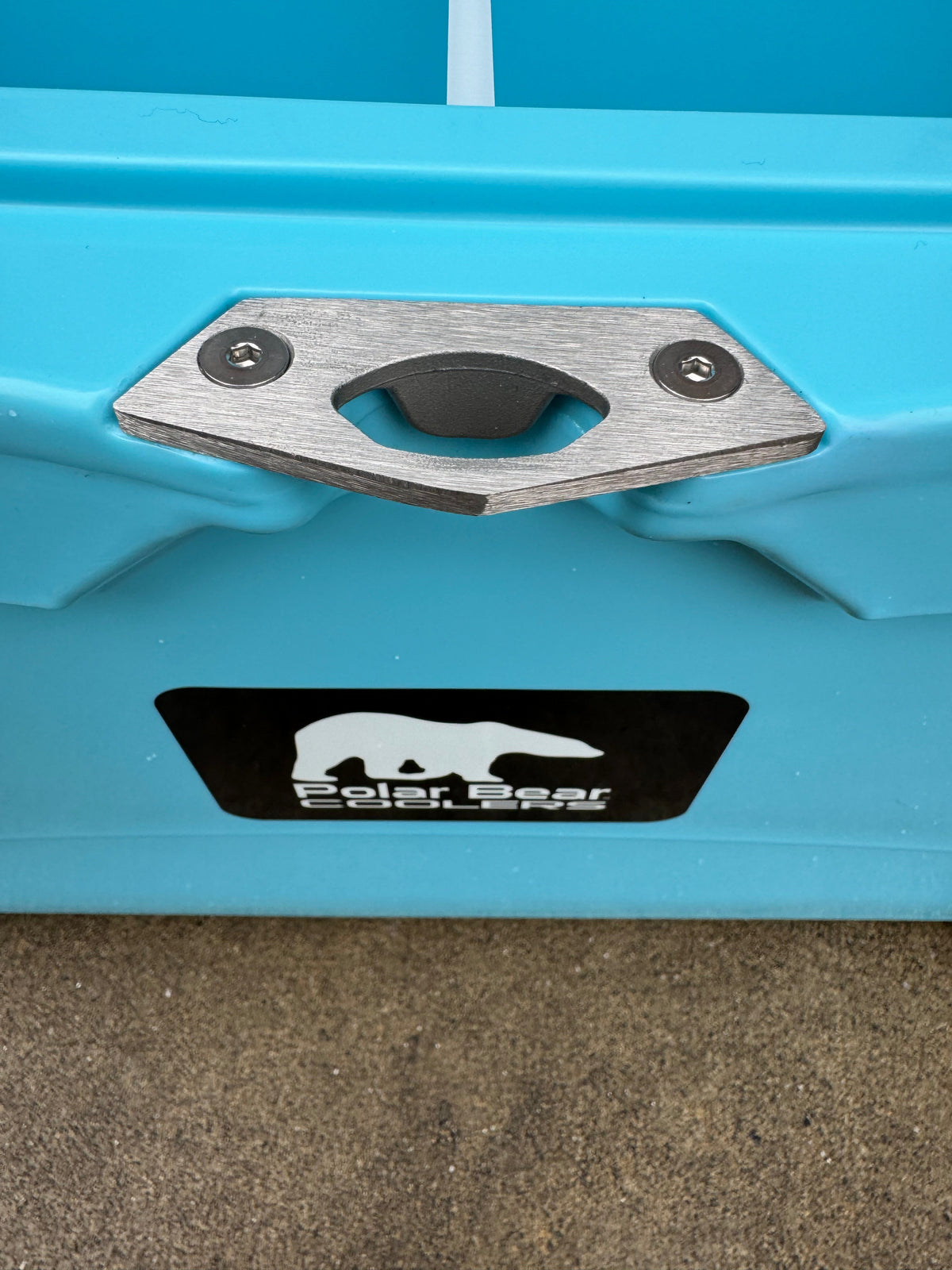 Polar Bear 45 Hard Cooler from Polar Bear Coolers, showing its sturdy design and handle for outdoor cooling adventures.