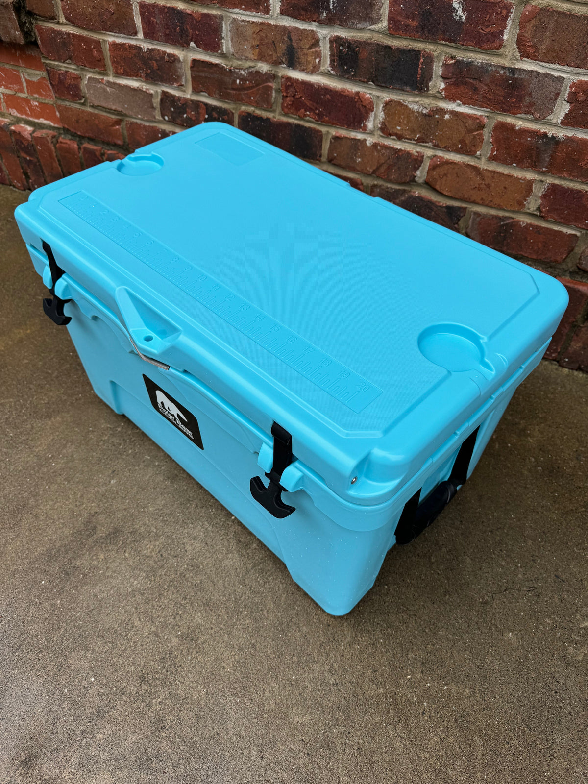 Polar Bear 45 Hard Cooler by Polar Bear Coolers, rugged portable cooler with insulated exterior, ideal for outdoor adventures.