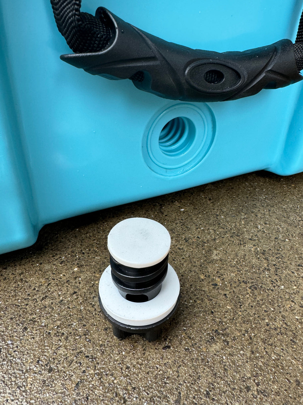 Polar Bear 45 Hard Cooler from Polar Bear Coolers, showing the sturdy gray insulated cooler with latches and handle.