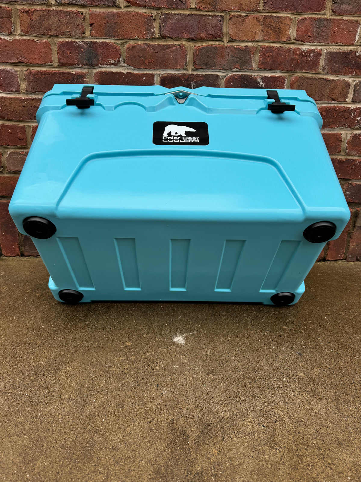 Polar Bear 45 Hard Cooler from Polar Bear Coolers, showing the sturdy, insulated cooler with a secure lid and rugged design.