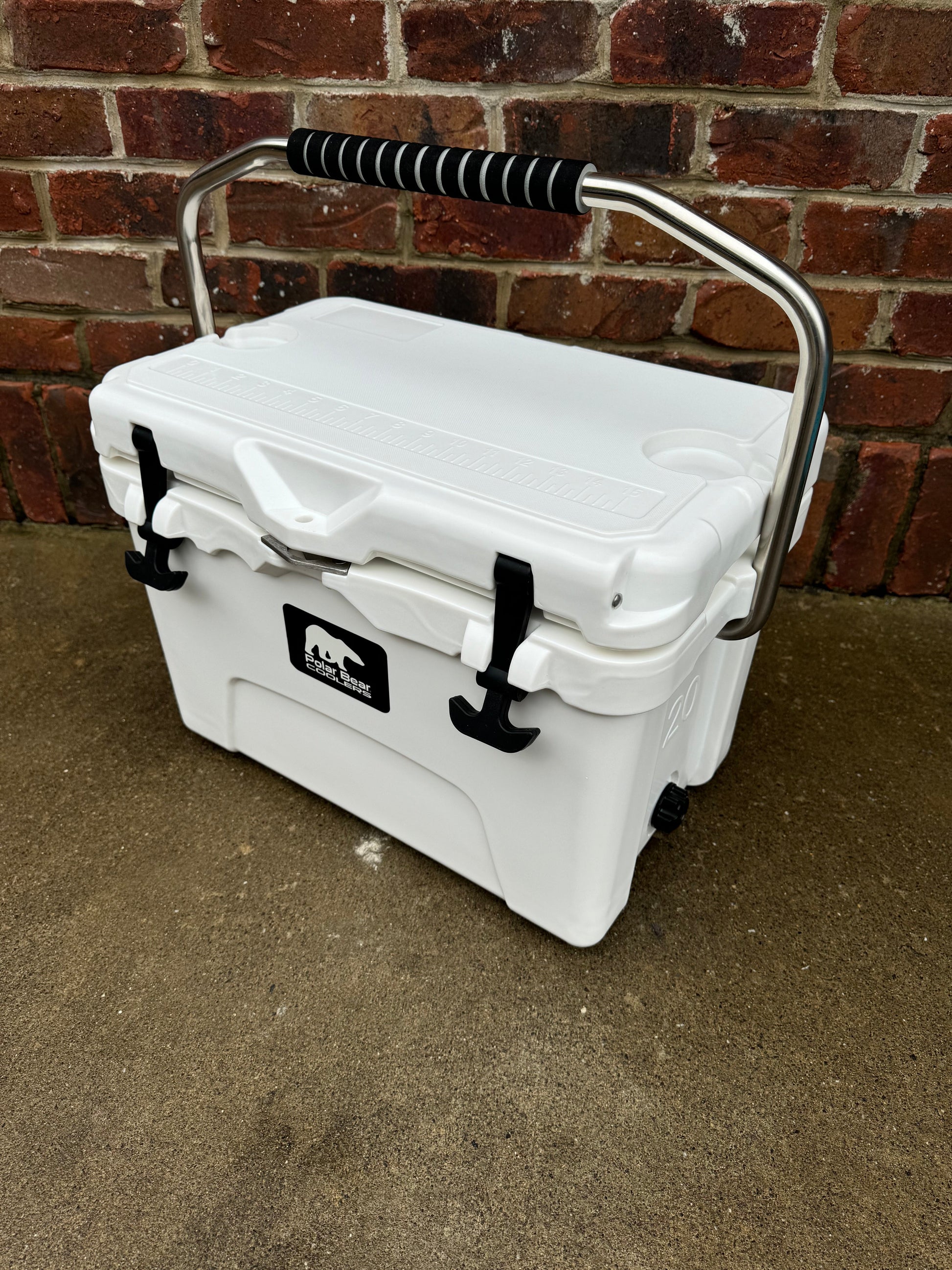 Polar Bear 20 Hard Cooler by Polar Bear Coolers, durable white ice chest with sturdy handle and secure lid for outdoor use.