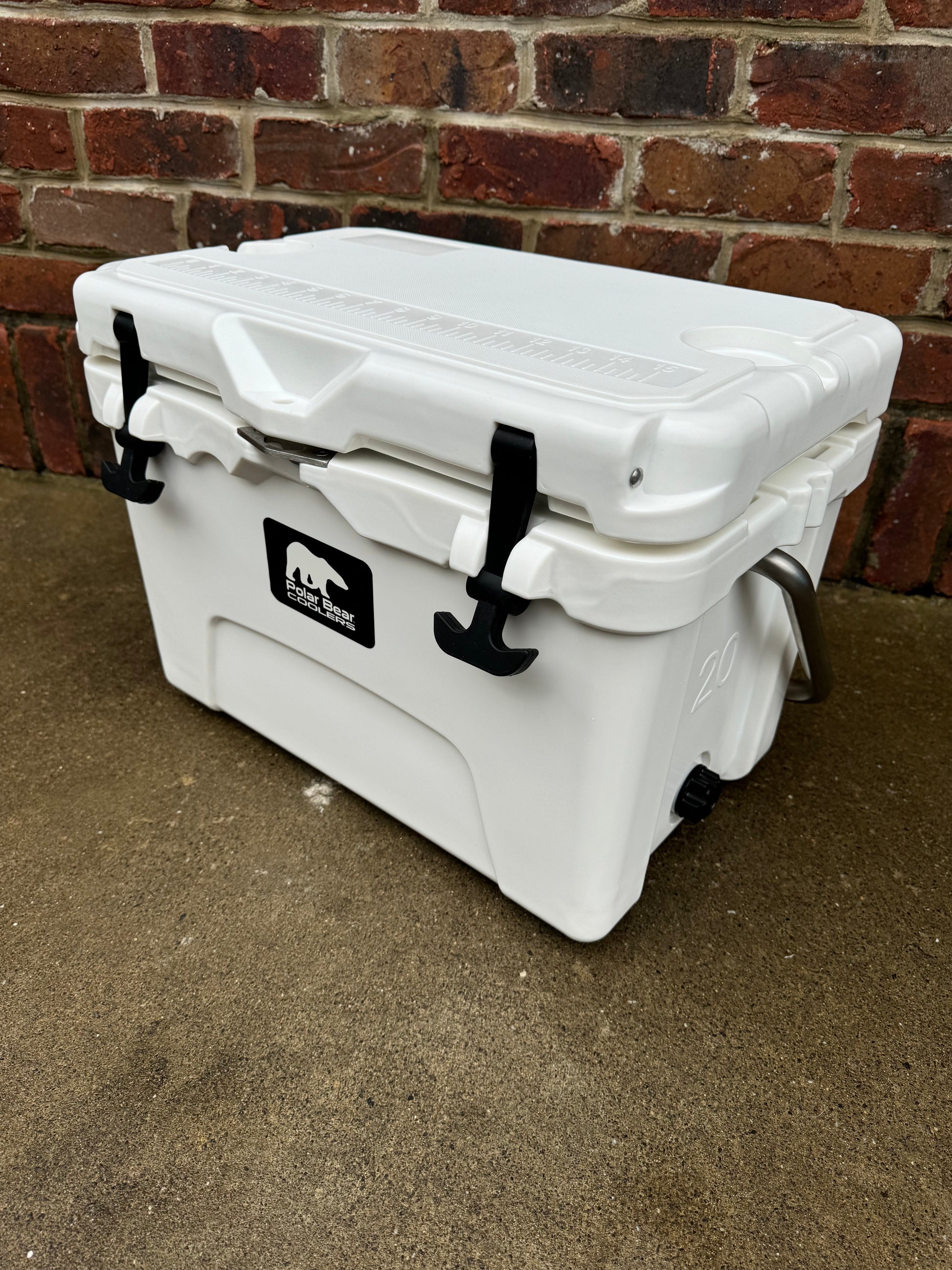 Polar Bear 20 Hard Cooler by Polar Bear Coolers with sturdy lid and durable exterior, ideal for outdoor cooling needs.