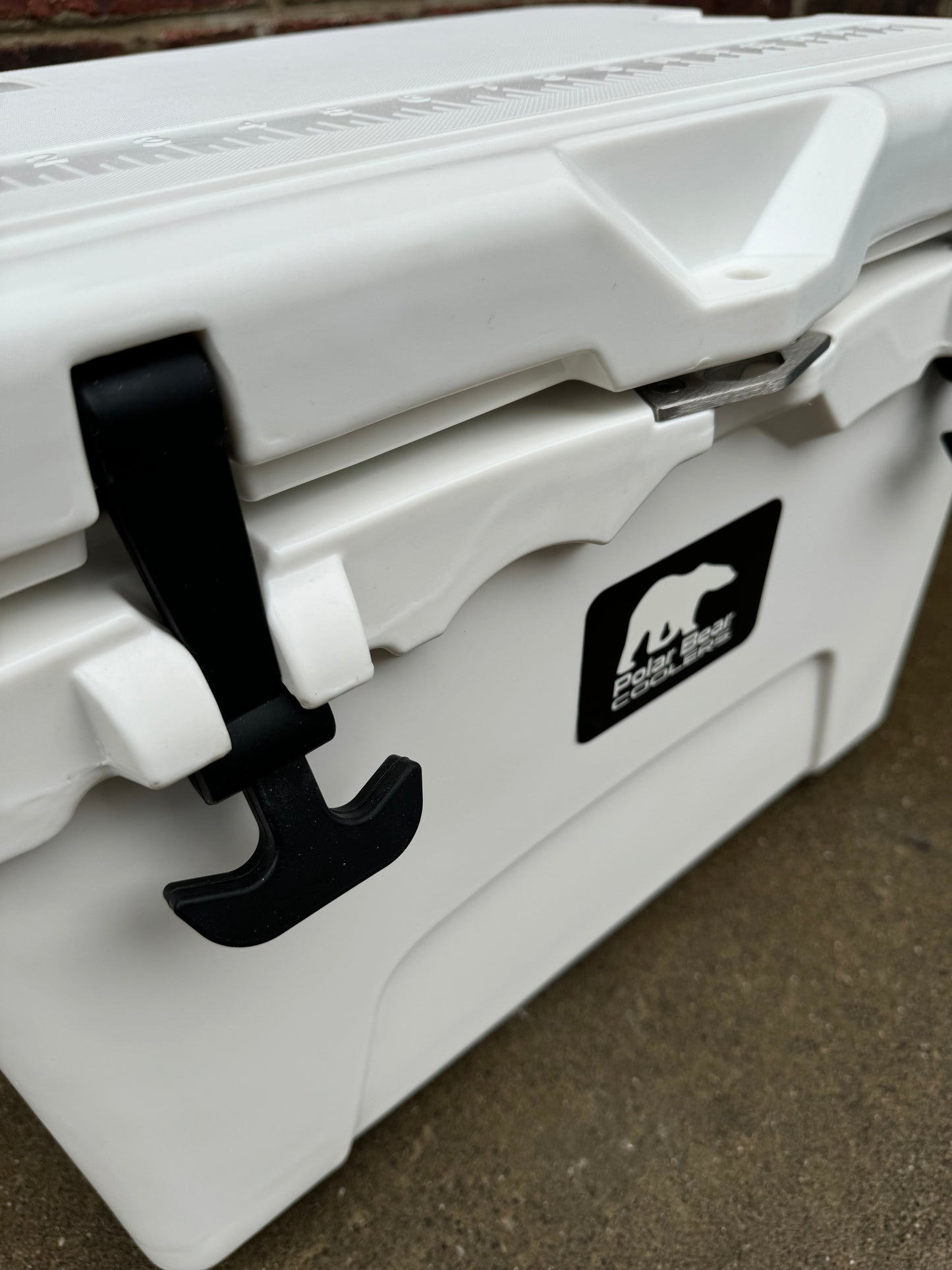 Polar Bear 20 Hard Cooler by Polar Bear Coolers, featuring a rugged white cooler with a sturdy handle and secure lid.