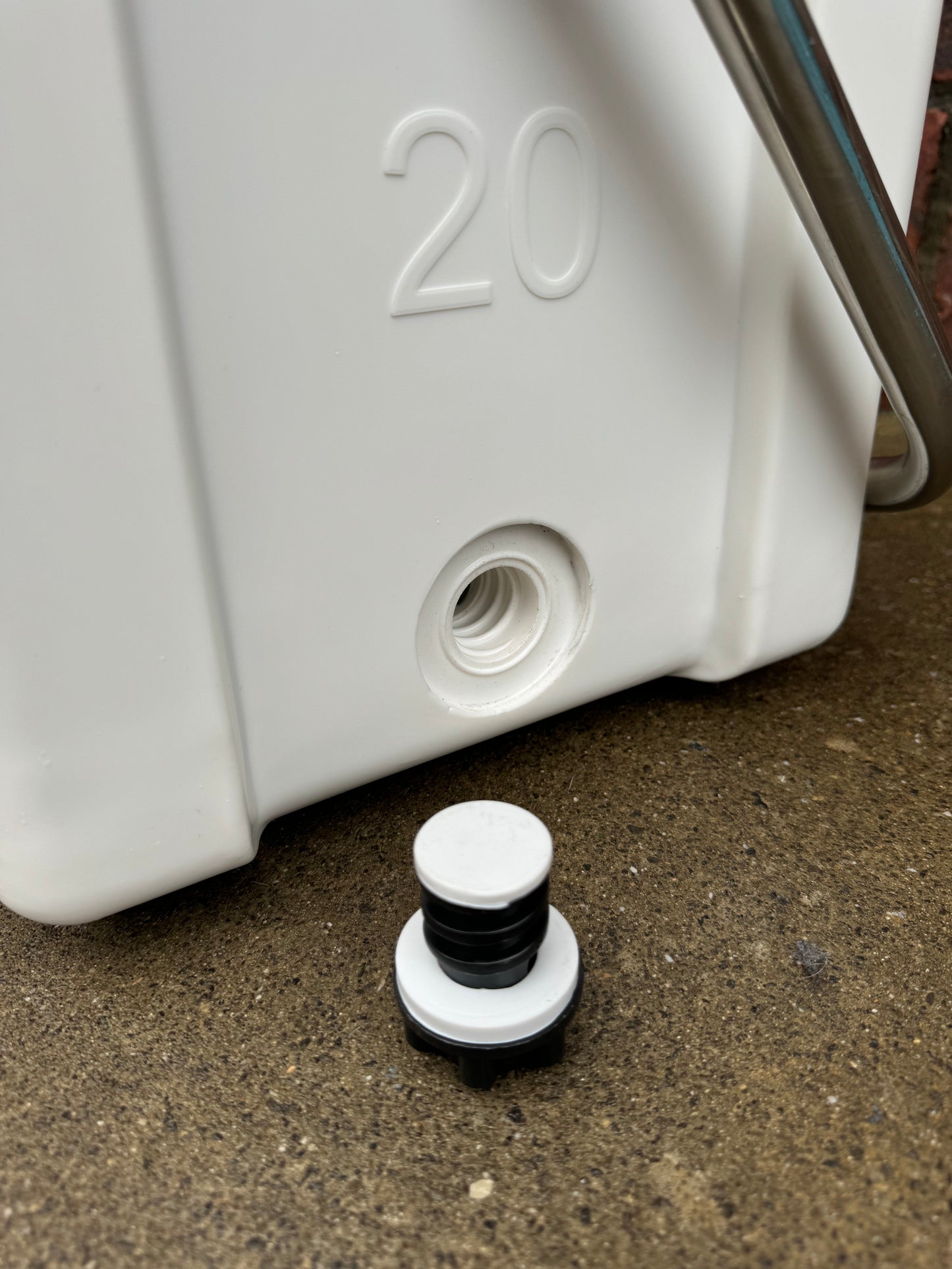 Polar Bear 20 Hard Cooler by Polar Bear Coolers, rugged white cooler with metal handle and secure lid, ideal for outdoor use.