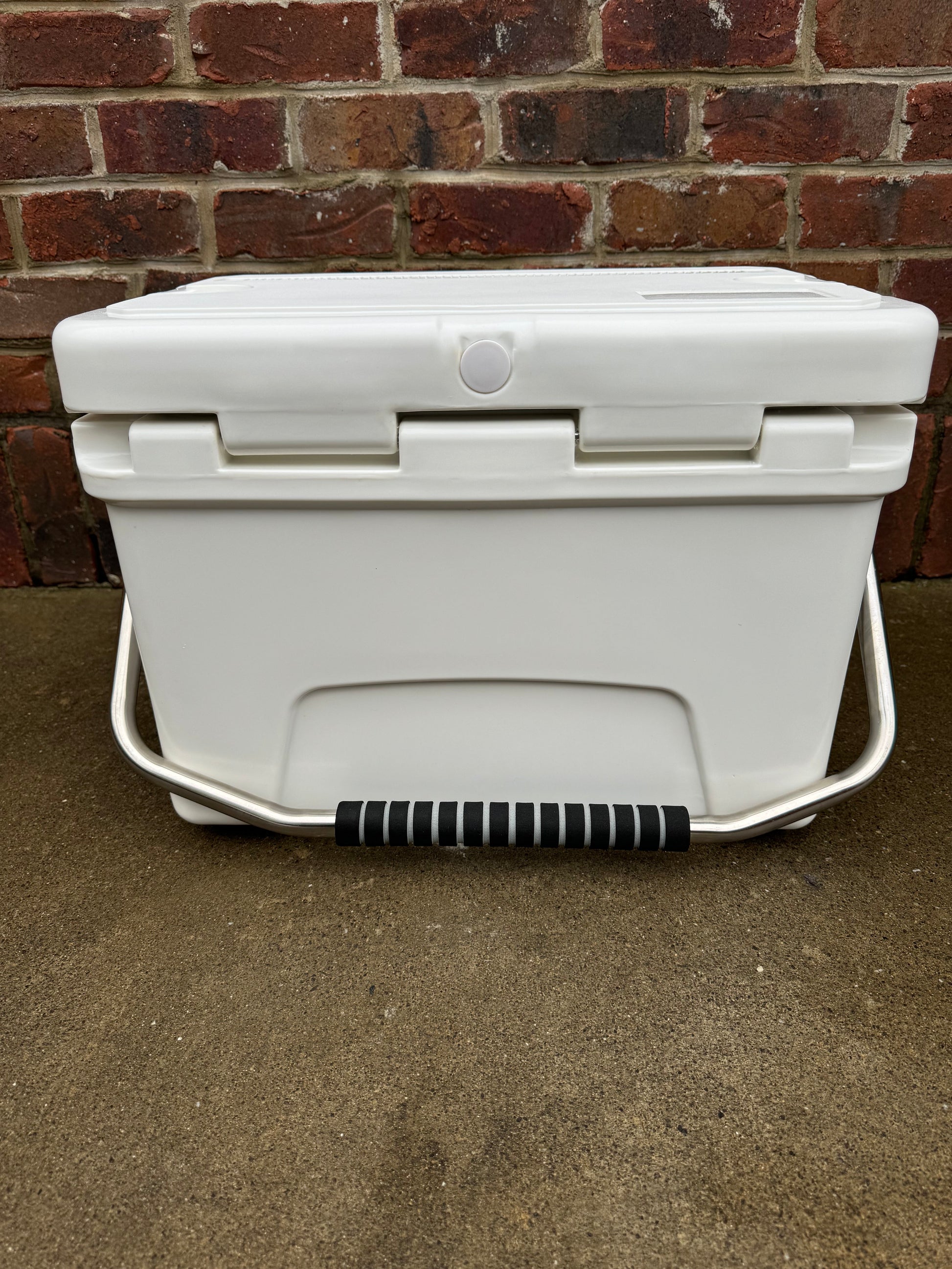 Polar Bear 20 Hard Cooler by Polar Bear Coolers, featuring rugged construction and secure lid, ideal for outdoor adventures.