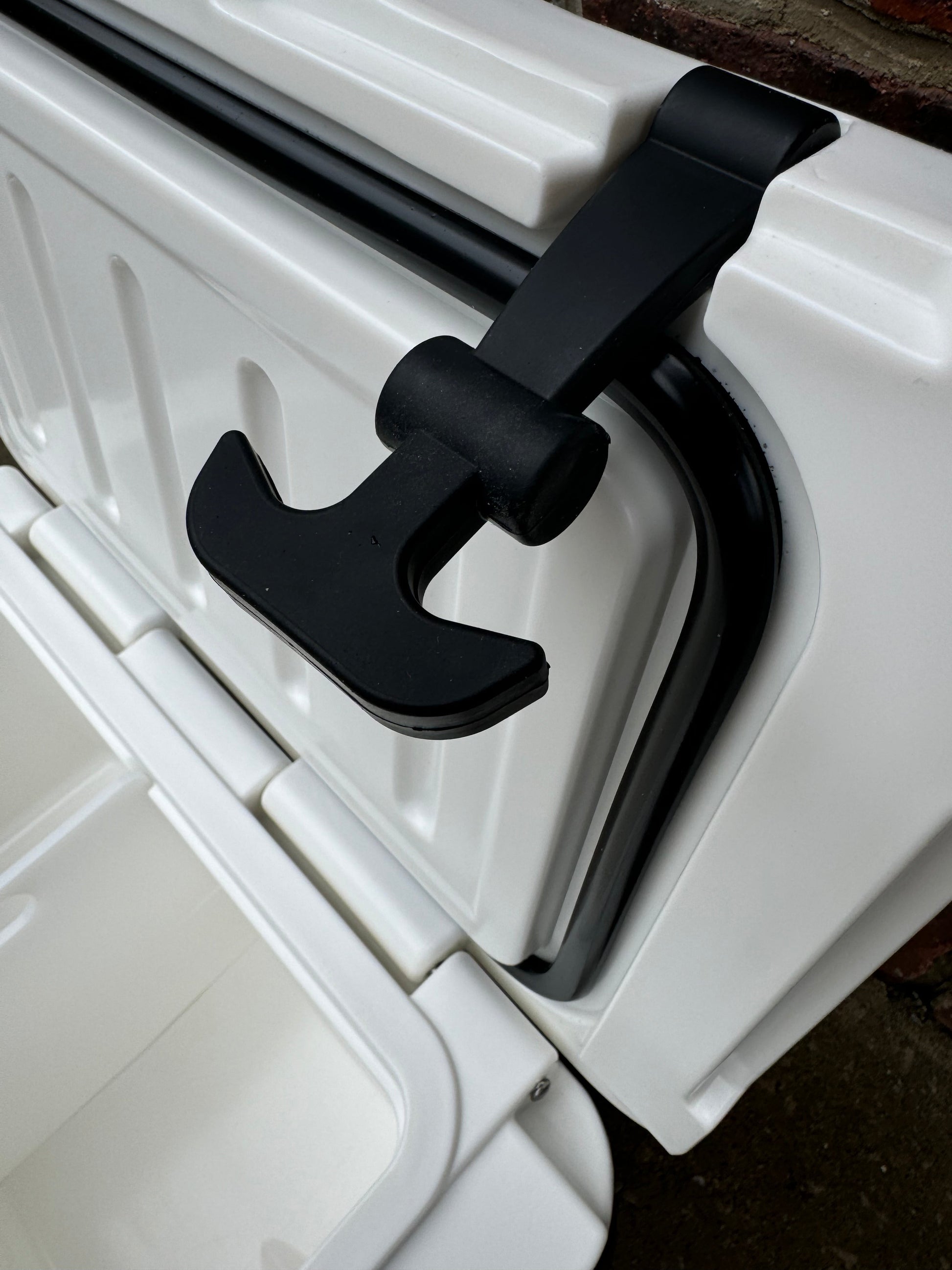 Polar Bear 20 Hard Cooler by Polar Bear Coolers, rugged insulated cooler with sturdy lid and handles, suitable for outdoor use.