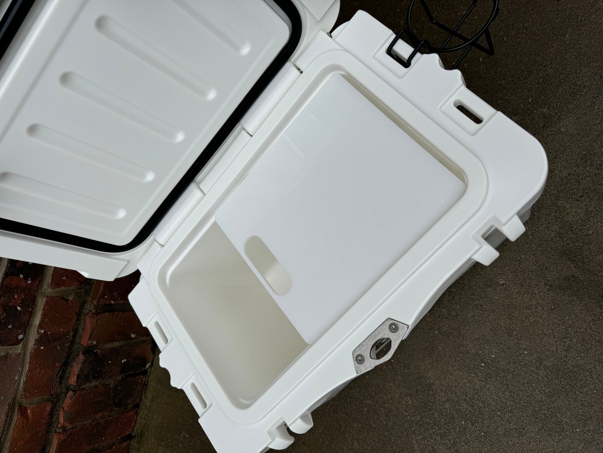 Polar Bear 20 Hard Cooler by Polar Bear Coolers, showing the sturdy white insulated cooler with a secure lid and handle.