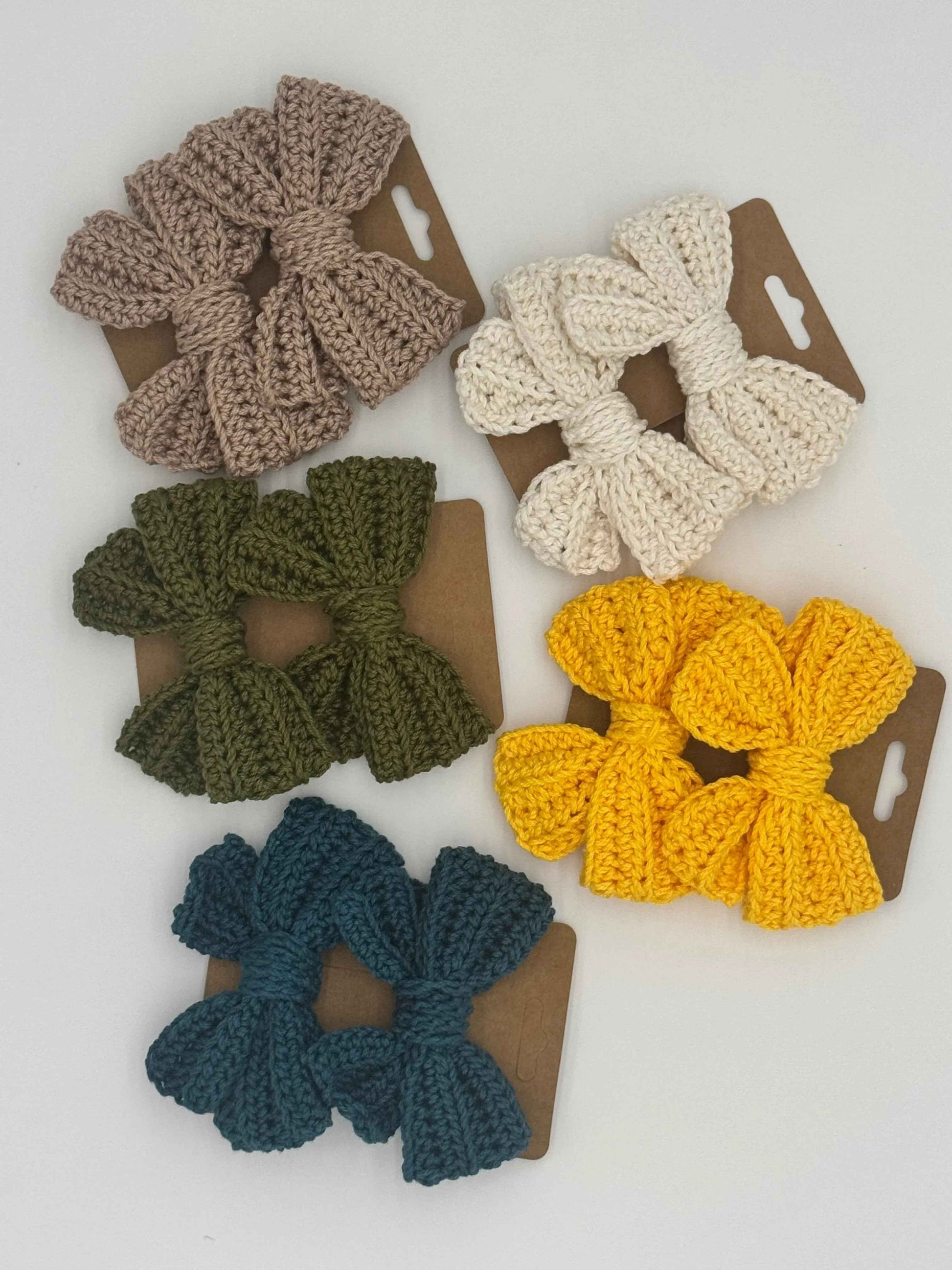 Handcrafted crochet bow hair accessory by C2 Creations LLC, featuring a delicate, colorful design perfect for hair styling.