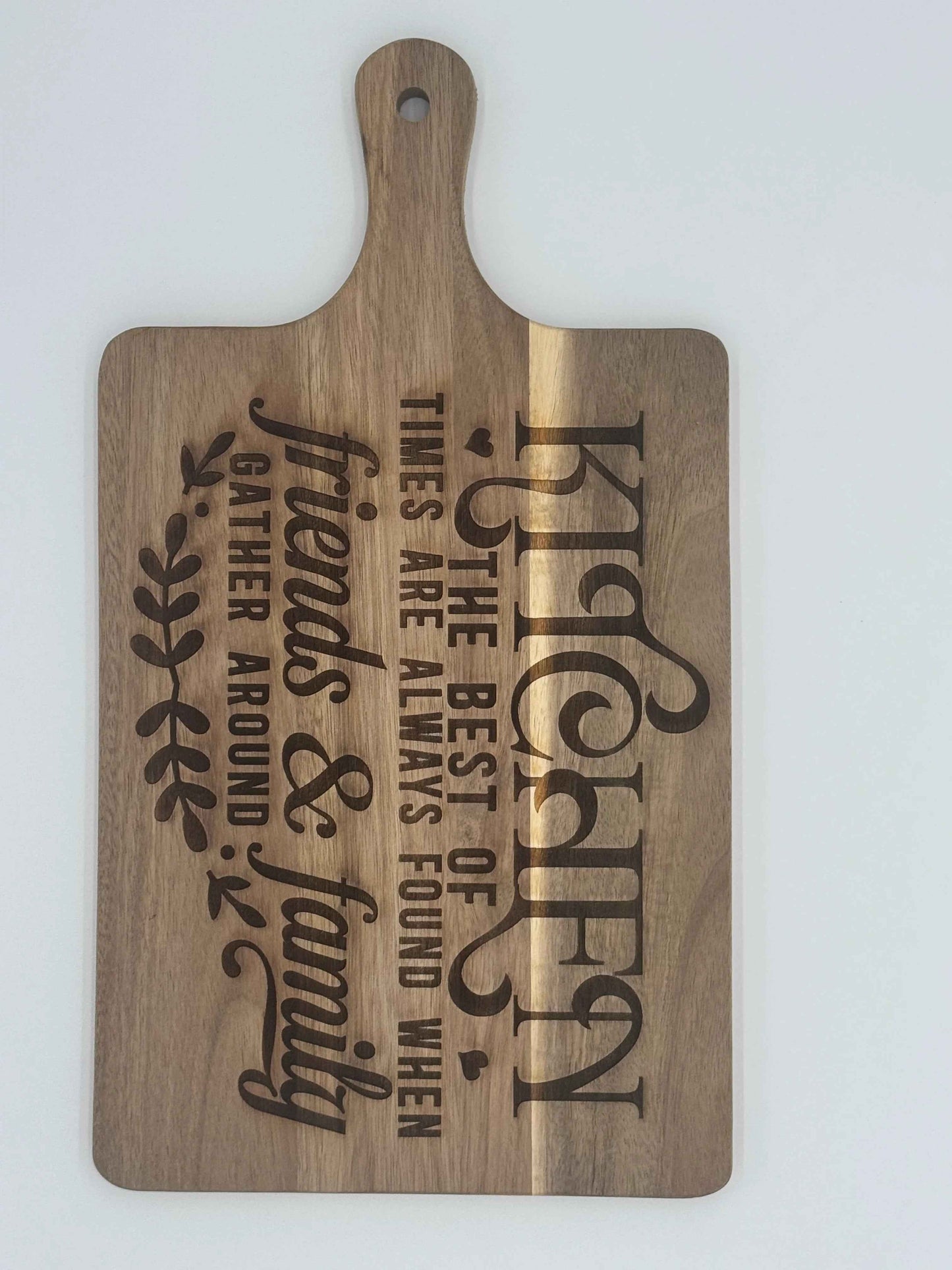 Personalized wooden cutting board from C2 Creations LLC, showing a custom engraved design ideal for serving and kitchen use.