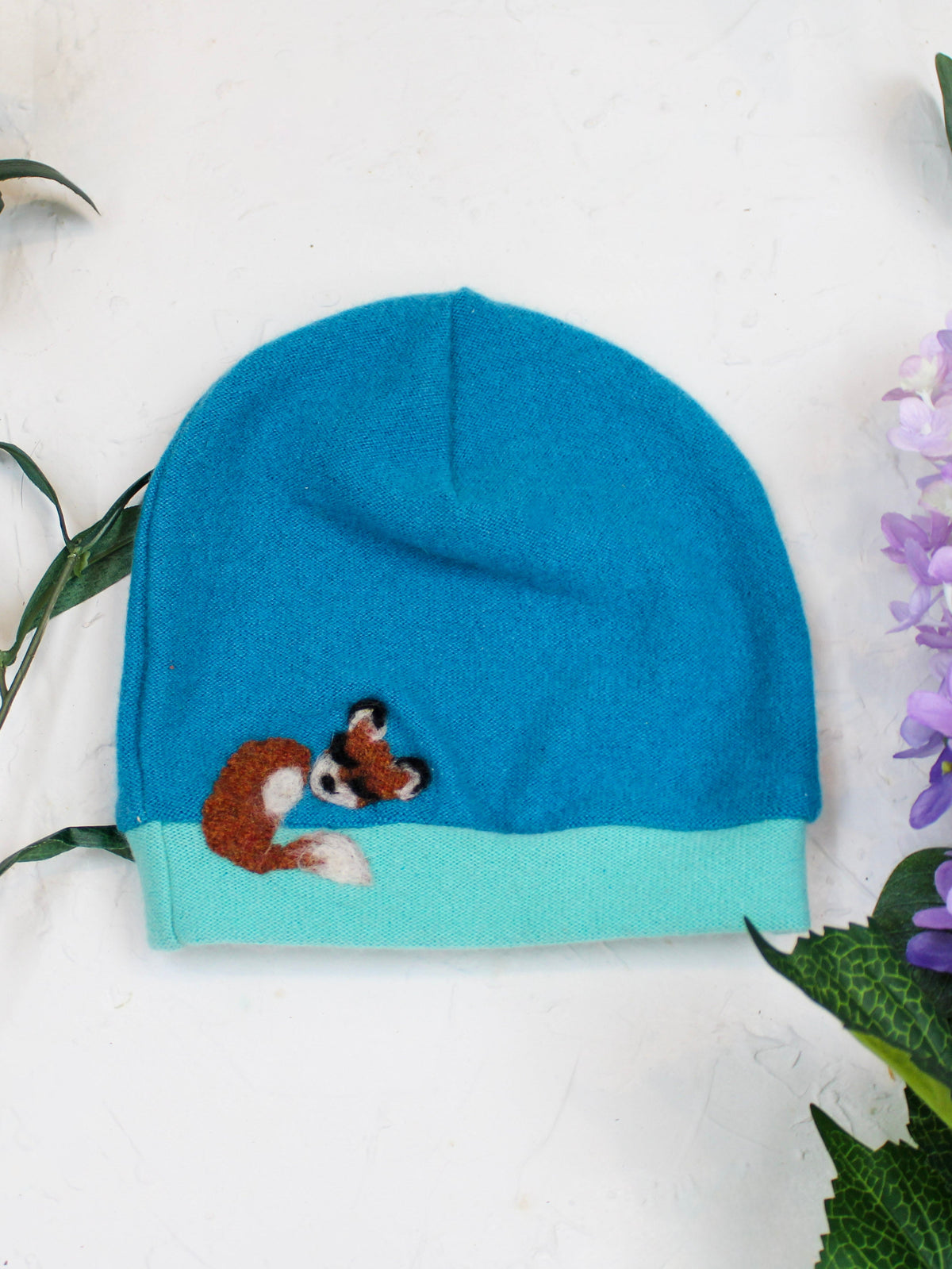Toddler Ash & Rose Sleeping Fox Cashmere Hat, soft cream-colored knit hat with fox design for warm, cozy wear.