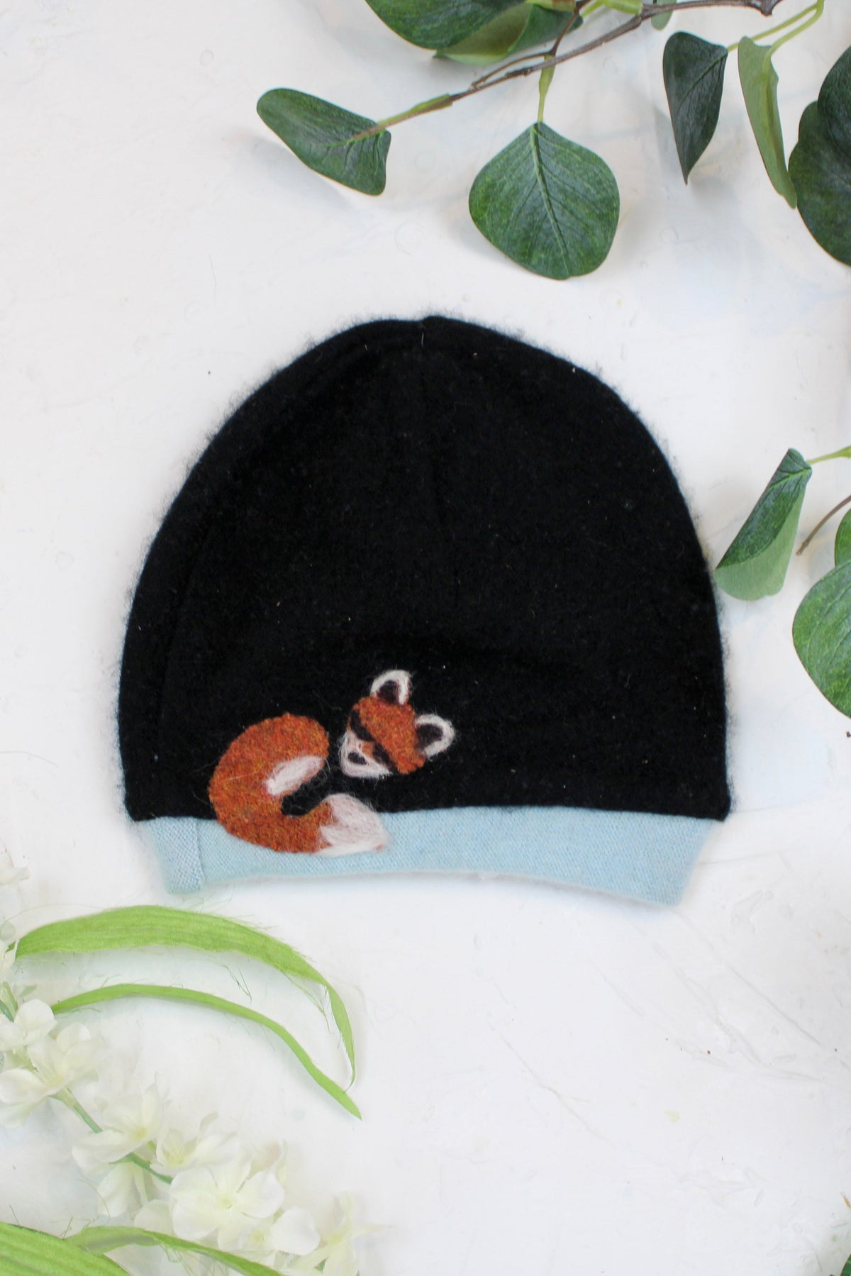 Toddler Sleeping Fox Cashmere Hat by Ash & Rose, soft beige hat with fox design, cozy and stylish for young children.