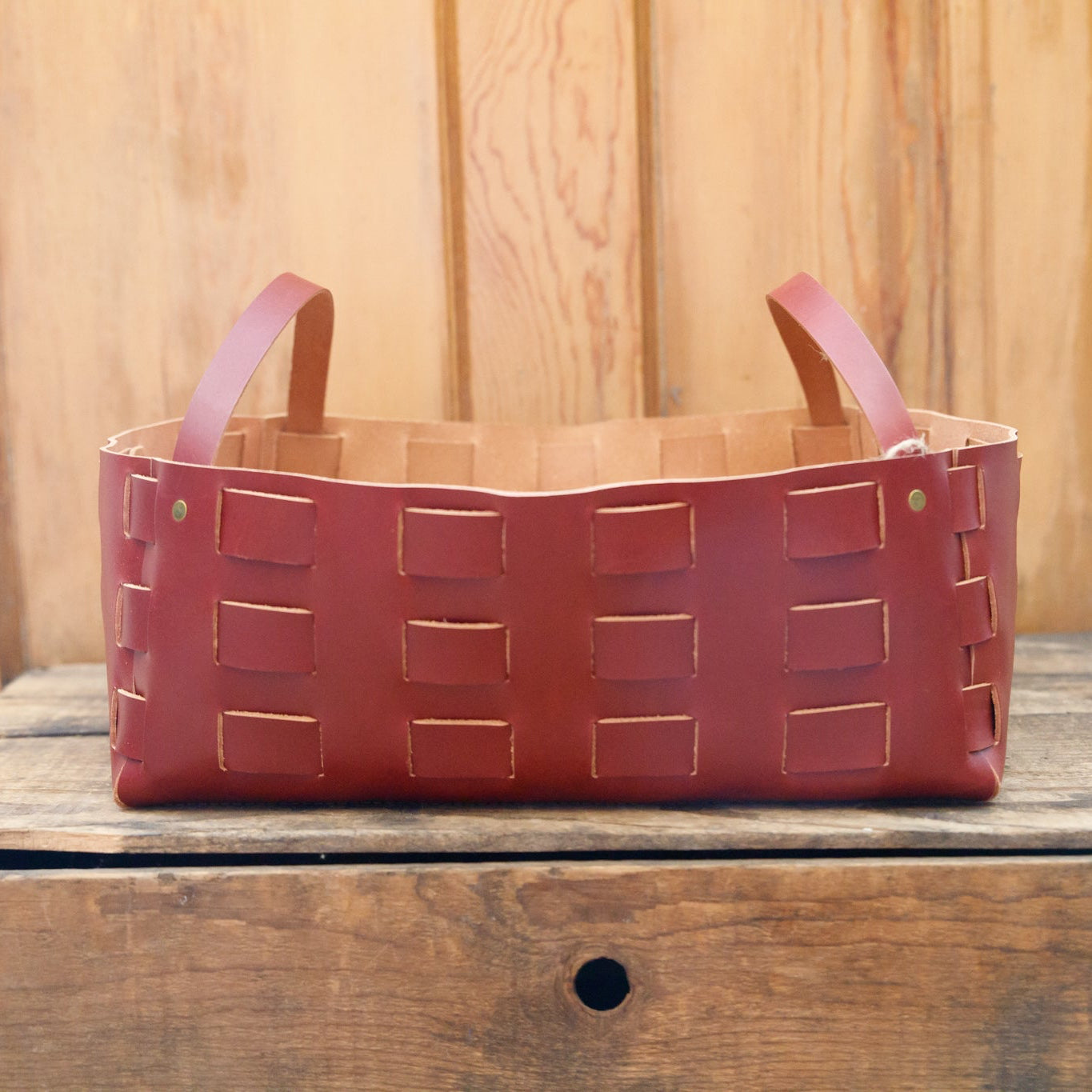 Large leather woven basket by The Local Branch, USA-made, featuring a sturdy leather design with woven detailing.