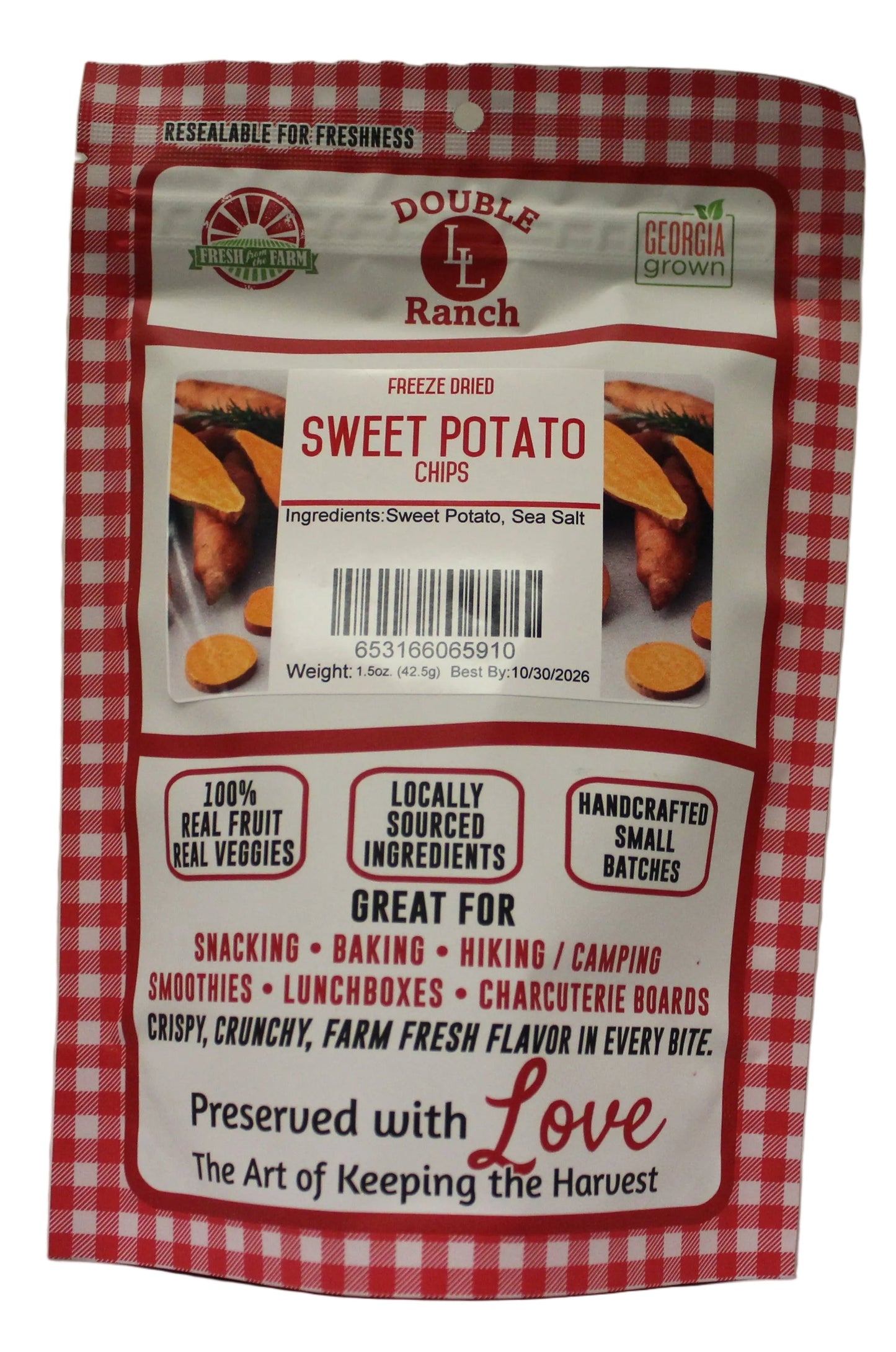 Freeze dried sweet potato chips by Double L Ranch, crispy orange snack with ridged texture and vibrant color.