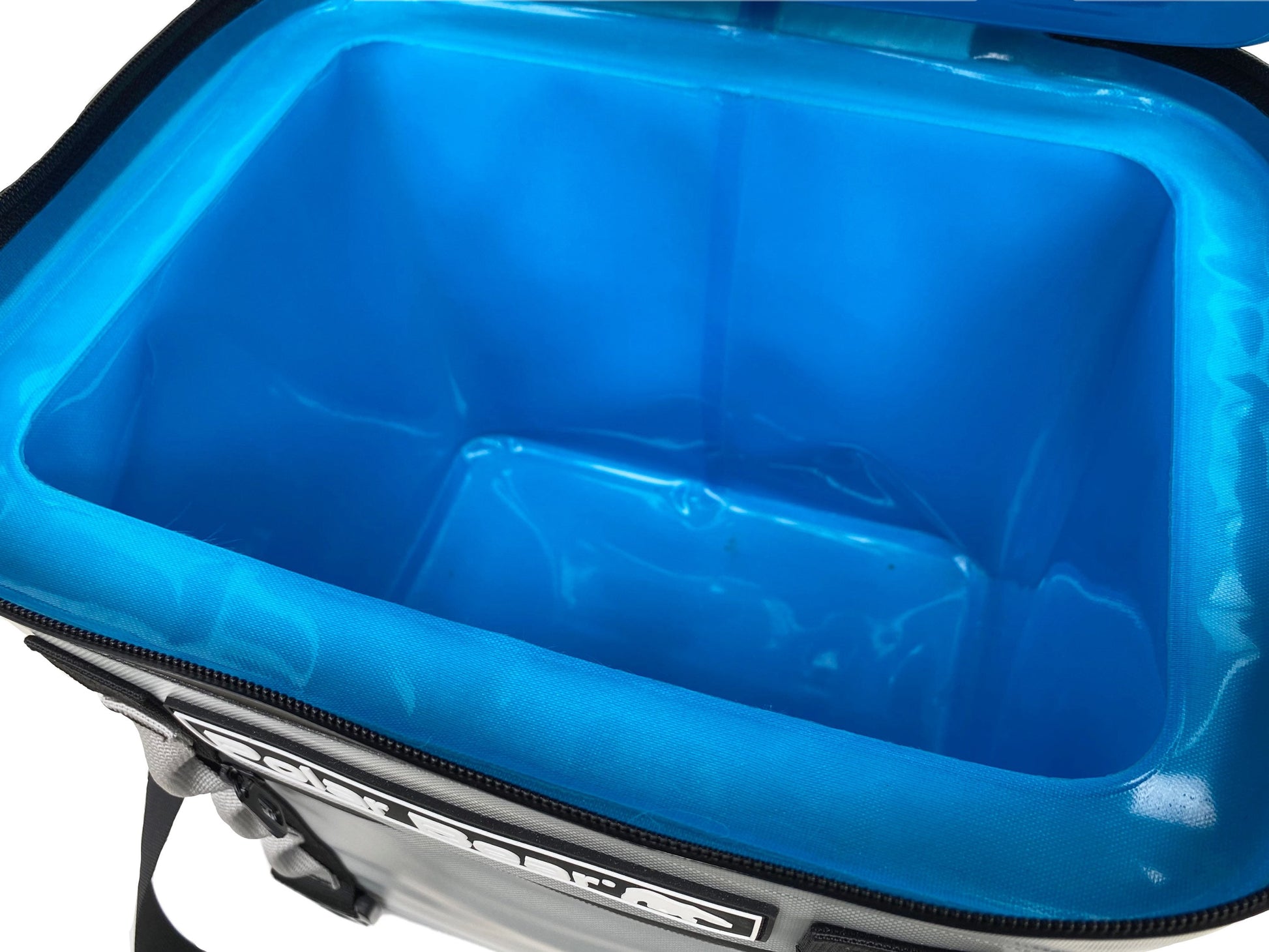Polar Bear Topper 20 cooler lid accessory by Polar Bear Coolers, featuring a white polar bear design on a black lid.