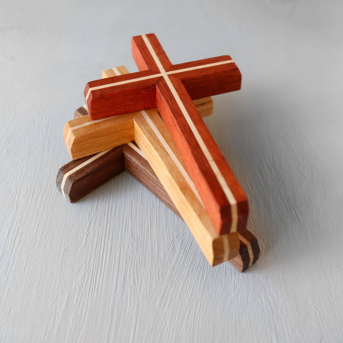 Wooden Thinline Cross by Dennehey Design Co. featuring a sleek, minimalist design with smooth wood grain and clean lines.