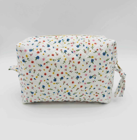 Handmade boxy makeup bag by C2 Creations LLC with wildflower meadow pattern, stylish toiletry storage with floral design.