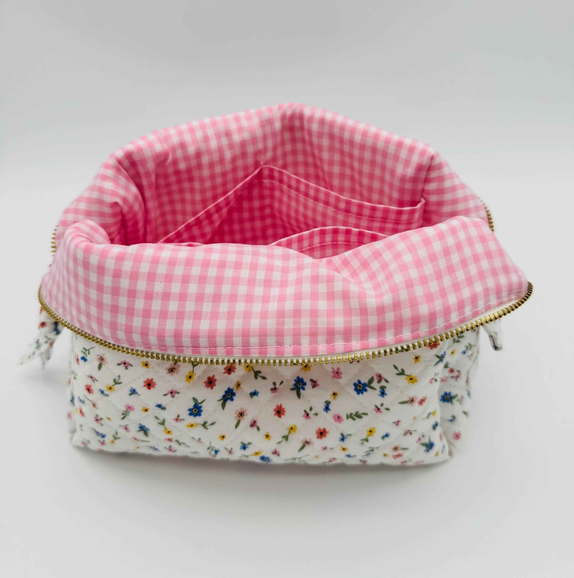 Handmade boxy makeup bag with Wildflower Meadow pattern from C2 Creations LLC, featuring a stylish toiletry bag design.