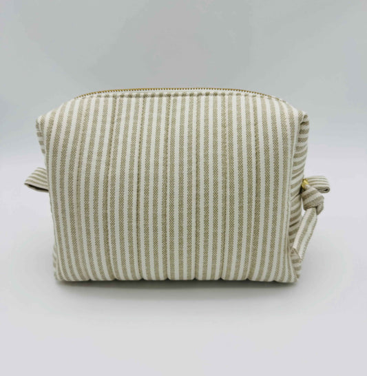 Handmade taupe and cream ticking stripe toiletry and makeup bag from C2 Creations LLC, boxy design with zipper closure.