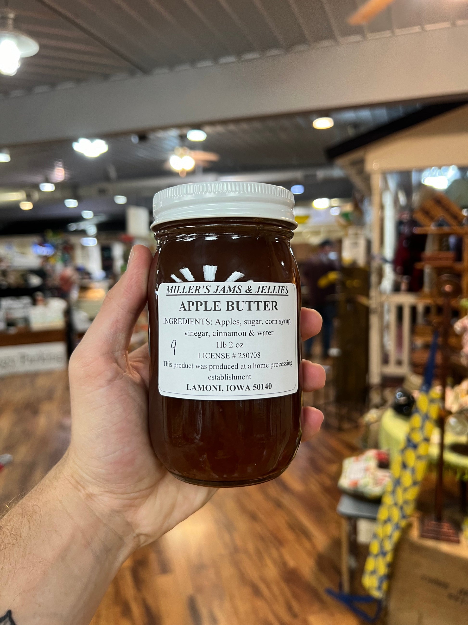 Amish Country Store Miller's Apple Butter in a jar, showcasing its smooth, rich apple spread made by Amish artisans.