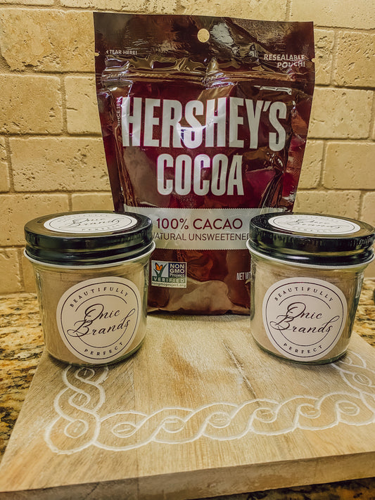 Onic Brands Hot Cocoa Mix in a jar, creamy chocolate drink mix with scoops and serving spoon, ready to prepare a warm beverage.