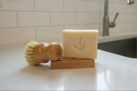MamaSuds dishwashing trio set with biodegradable bottles and cleaning sponges for eco-friendly household dishwashing.