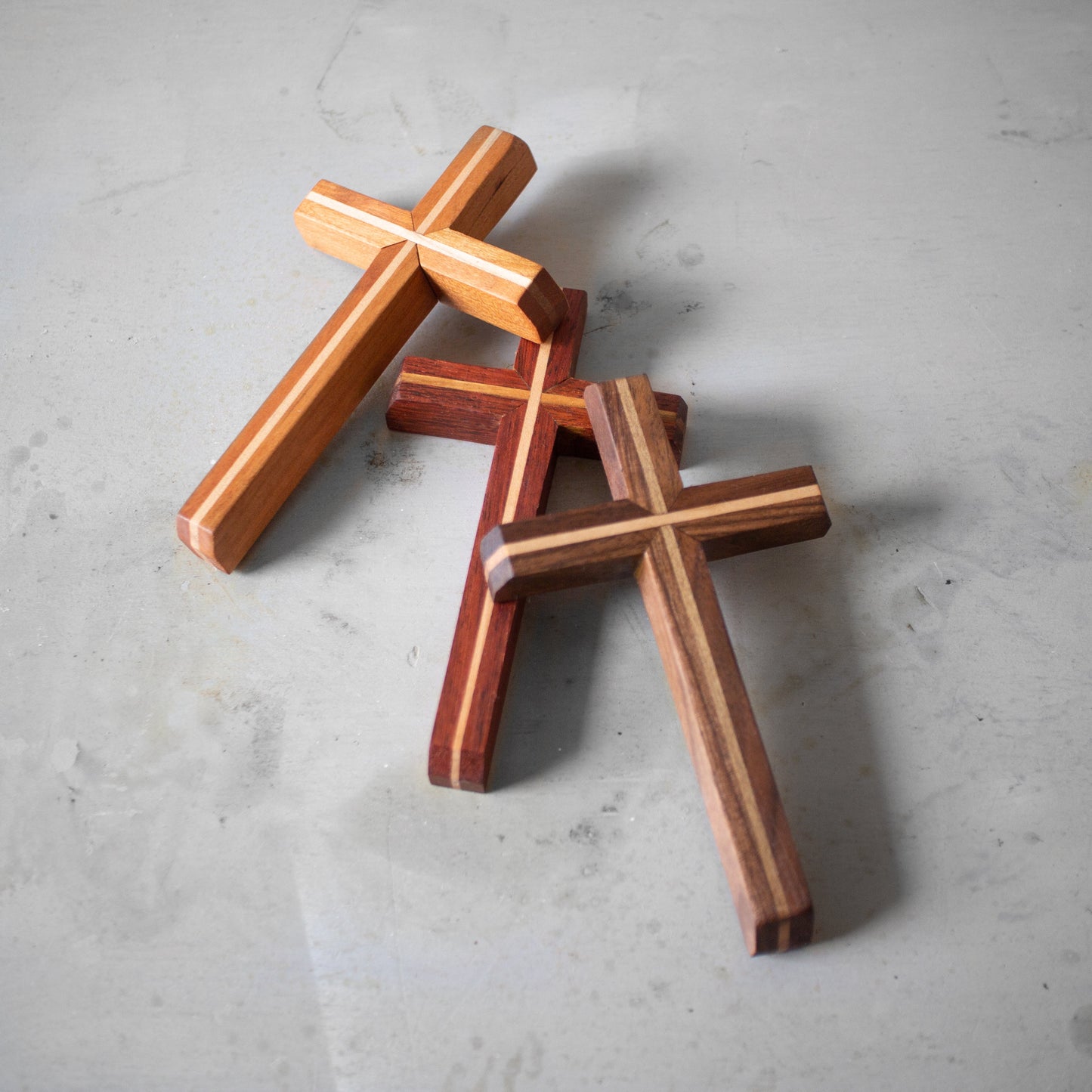 Wooden cross from Dennehey Design Co., The Thinline Cross, featuring sleek, minimalist design and natural wood finish.