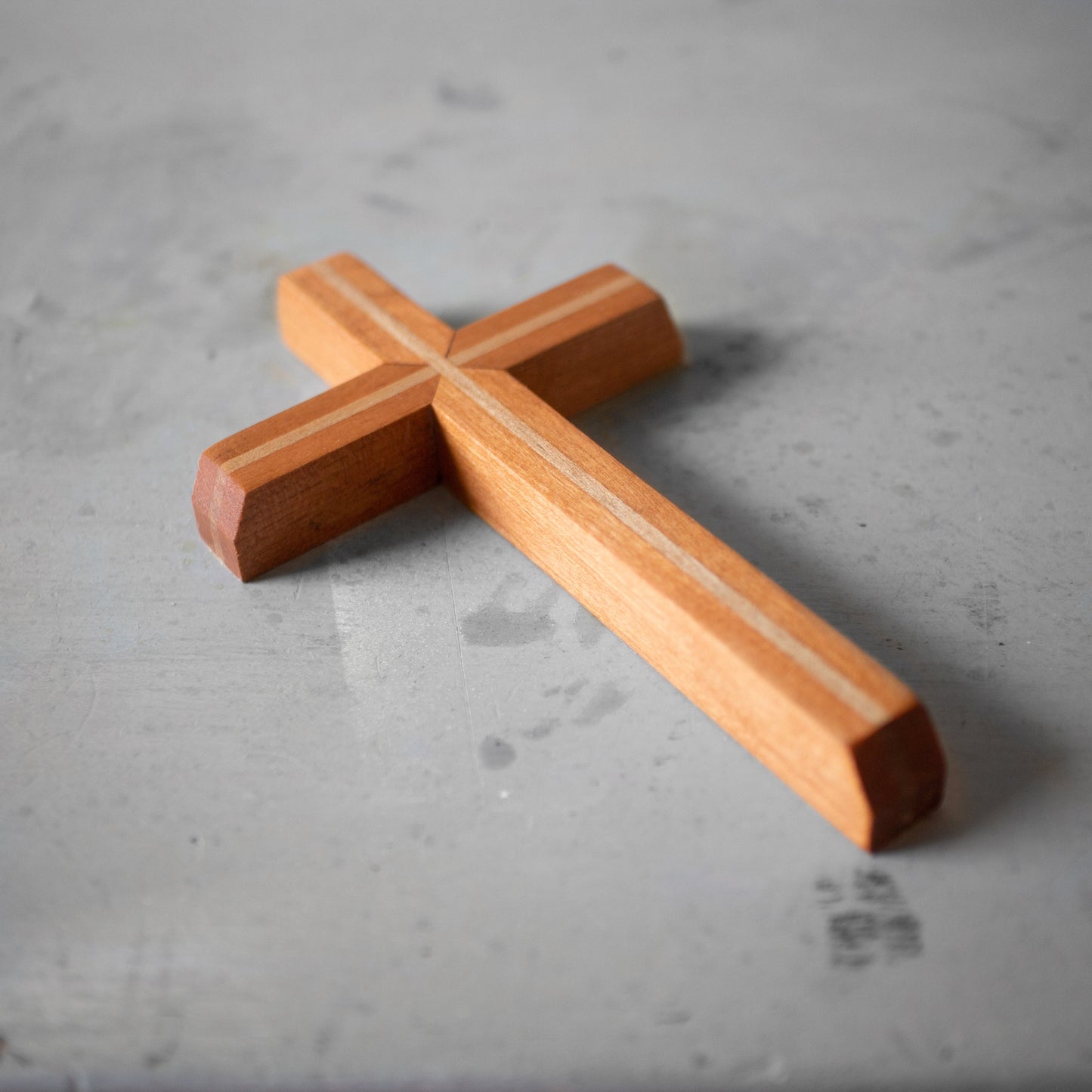 Wooden Thinline Cross by Dennehey Design Co. with sleek, minimalist design, showcasing smooth wood grain and refined craftsmanship.