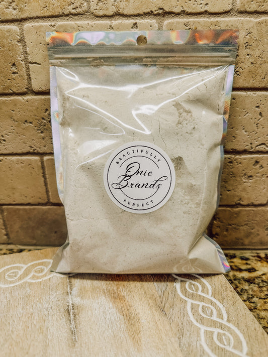 Pumpkin pancake dry mix by Onic Brands LLC in a bag, ready for baking, with a pumpkin and spice flavor theme.