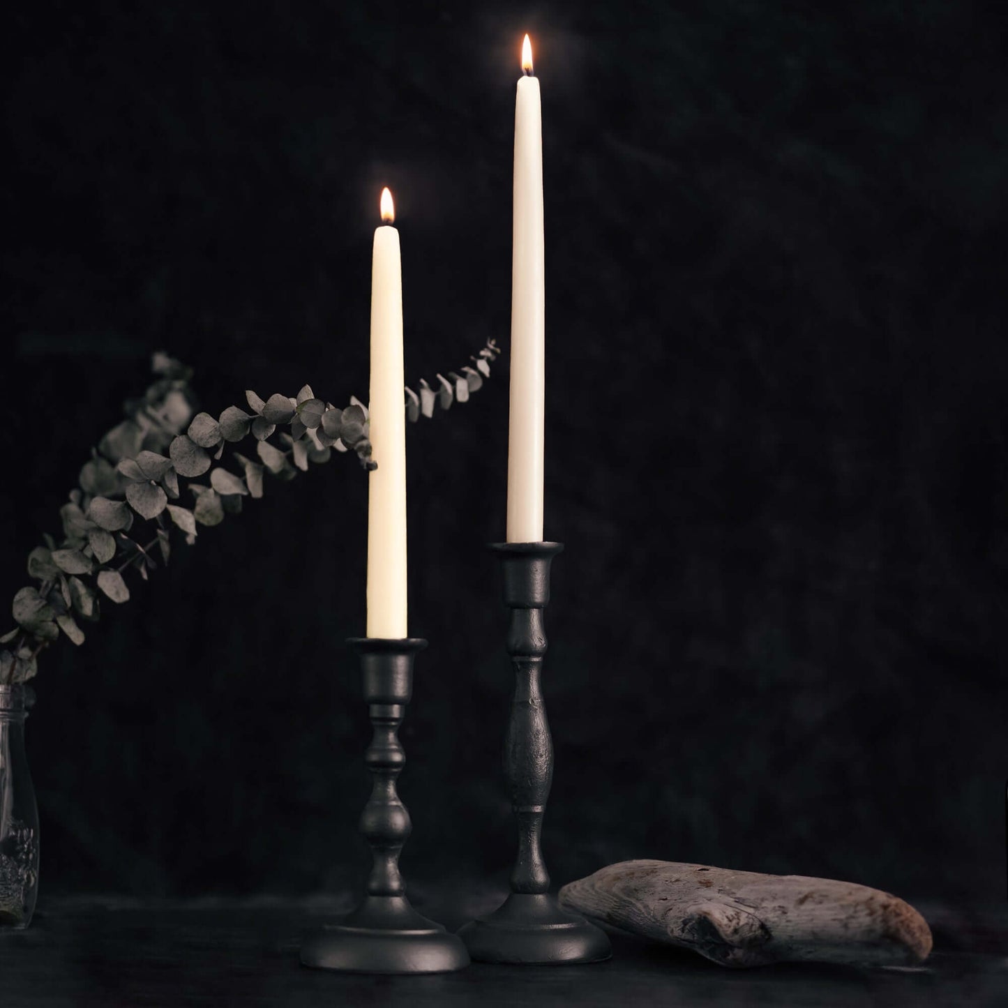 Set of four hand-dipped ivory beeswax taper candles from Bluecorn Candles with gray candlesticks, in a bulk 4-pair bundle.