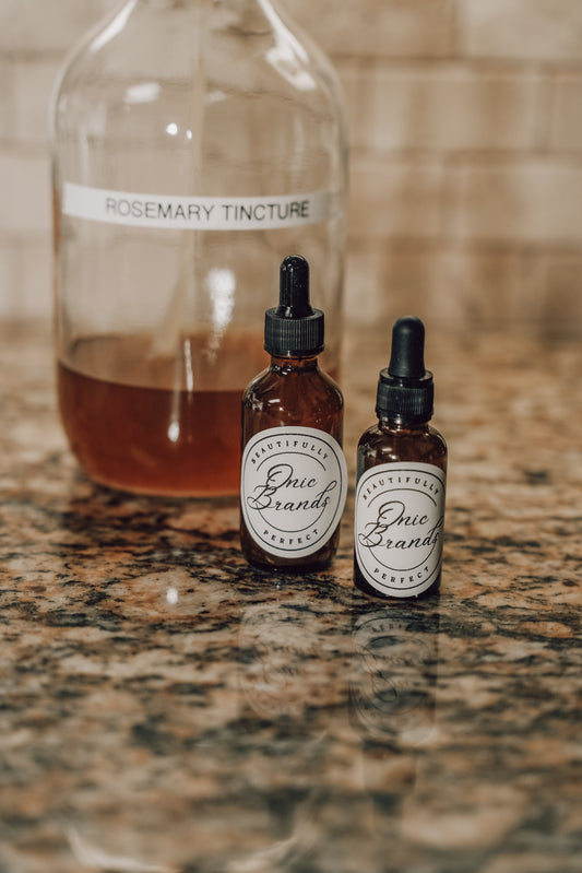 Onic Brands Elemental Rosemary Tincture bottle with label, natural herbal supplement for wellness and aromatherapy use.