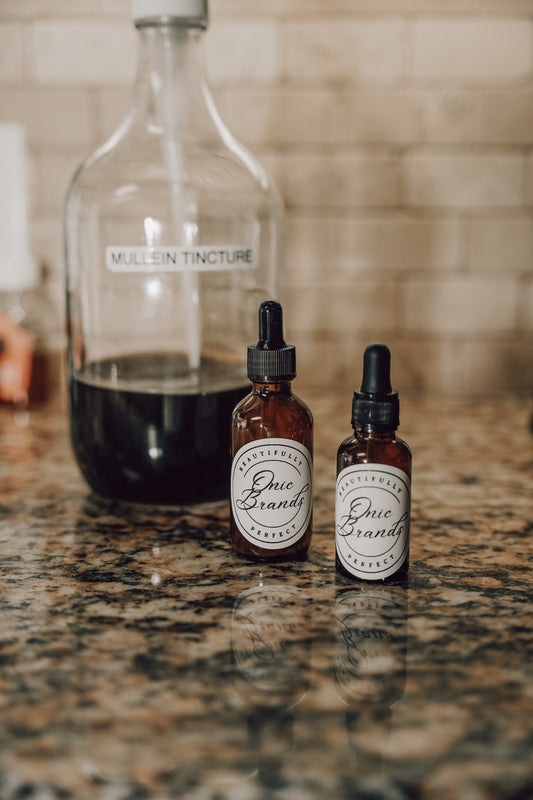 Onic Brands Elemental Mullein Tincture in a glass dropper bottle, showing the tincture liquid and label.