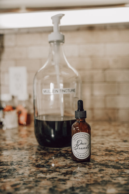 Onic Brands Elemental Mullein tincture bottle with dropper cap, natural herbal supplement for respiratory support.