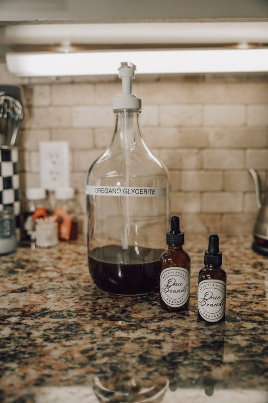 Onic Brands Elemental Oregano Glycerite tincture bottle with dropper cap, showcasing herbal supplement packaging.