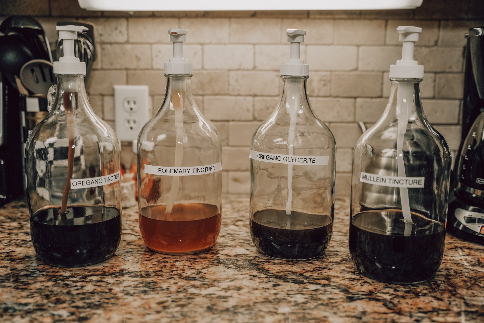 Onic Brands Elemental Mullein Tincture bottle with dropper, herbal supplement for respiratory health, on a neutral background.