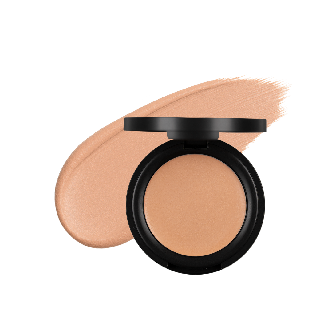 Cream concealer in khaki shade from Taylor Made Organics, lightweight and versatile for natural coverage.