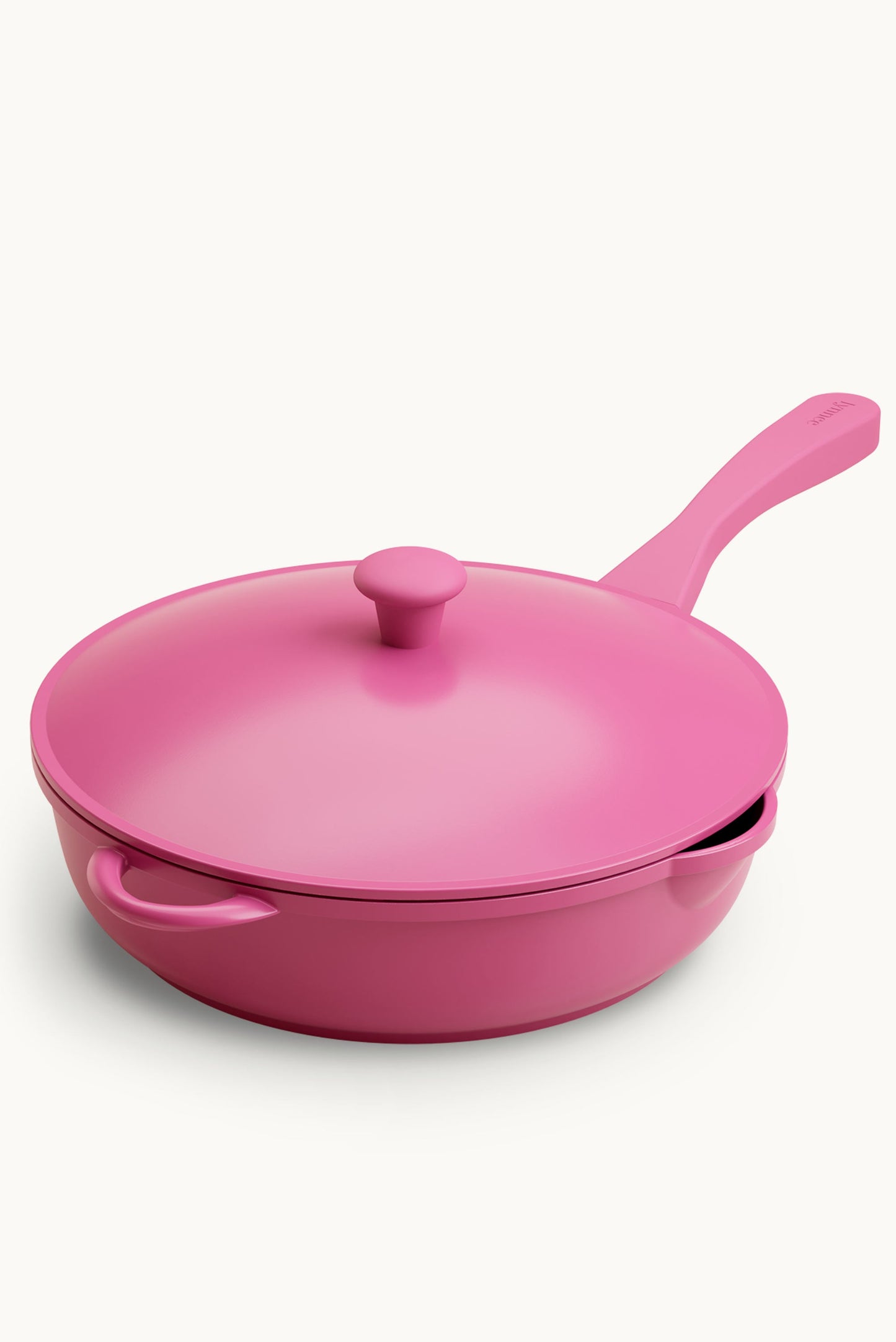Pink 11-inch Lynnee frying pan with a non-stick surface and ergonomic handle, shown from a top-down view.