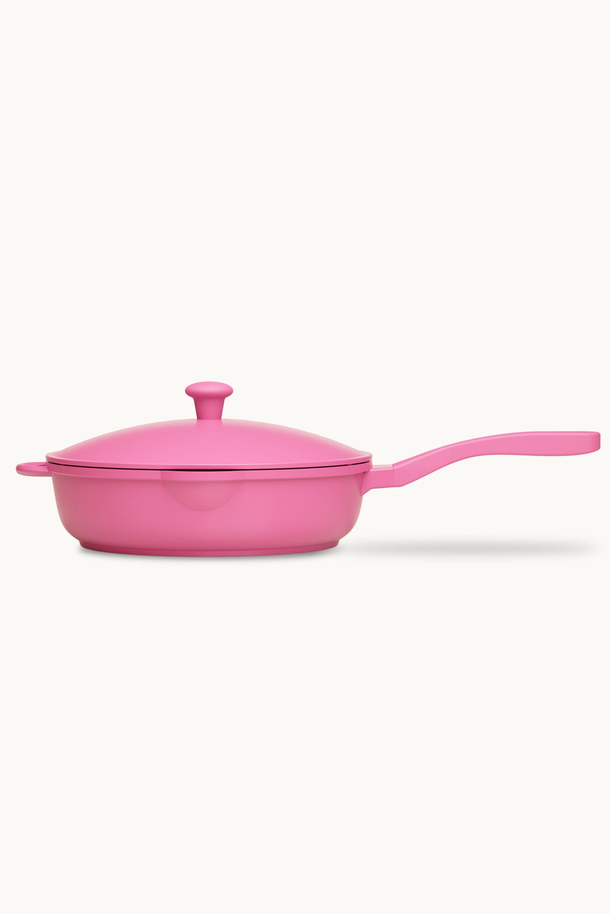Lynnee 11-inch pink frying pan with a non-stick surface and ergonomic handle, ideal for cooking eggs, pancakes, and stir-fries.