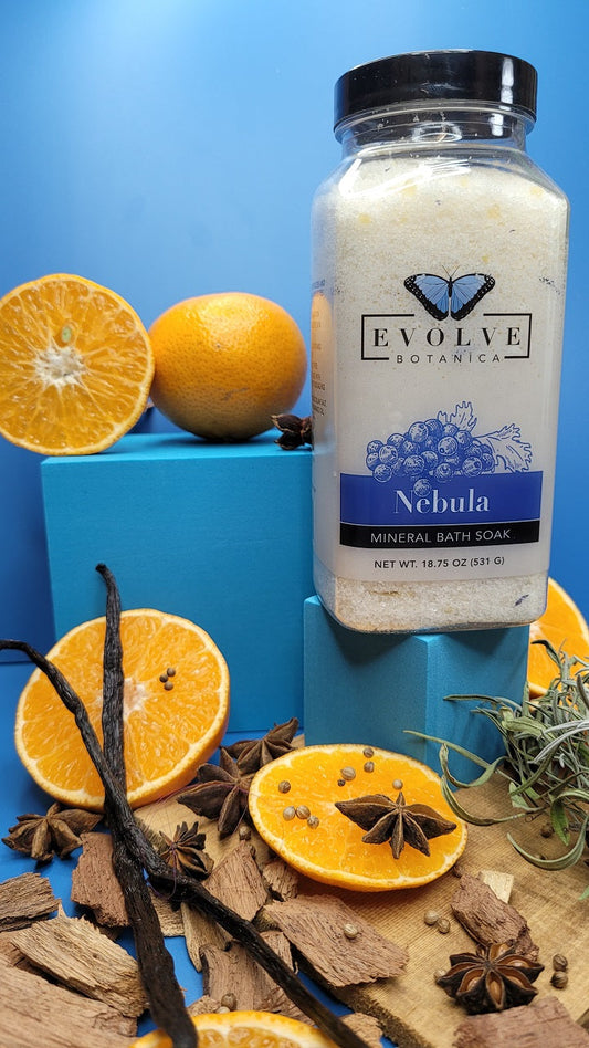 Evolve Botanica Mineral Soak Nebula bath salt in a jar with colorful natural mineral crystals and botanical herbs.