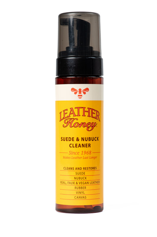 Leather Honey Suede and Nubuck Cleaner for leather care, showing the product bottle with a clean leather surface.