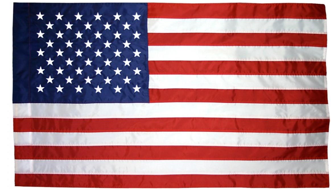 Liberty™ nylon American flag with sleeve, made in USA, showing vibrant red, white, and blue stars and stripes by Flagman of America