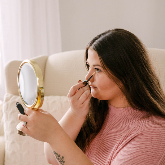 Liquid Organic Concealer by Taylor Made Organics, featuring a creamy texture and natural finish, applied on a model's face.
