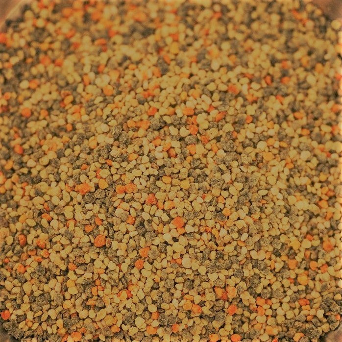 Bee pollen harvested from wildflowers, displayed in a natural setting, by Mickelberry Gardens.