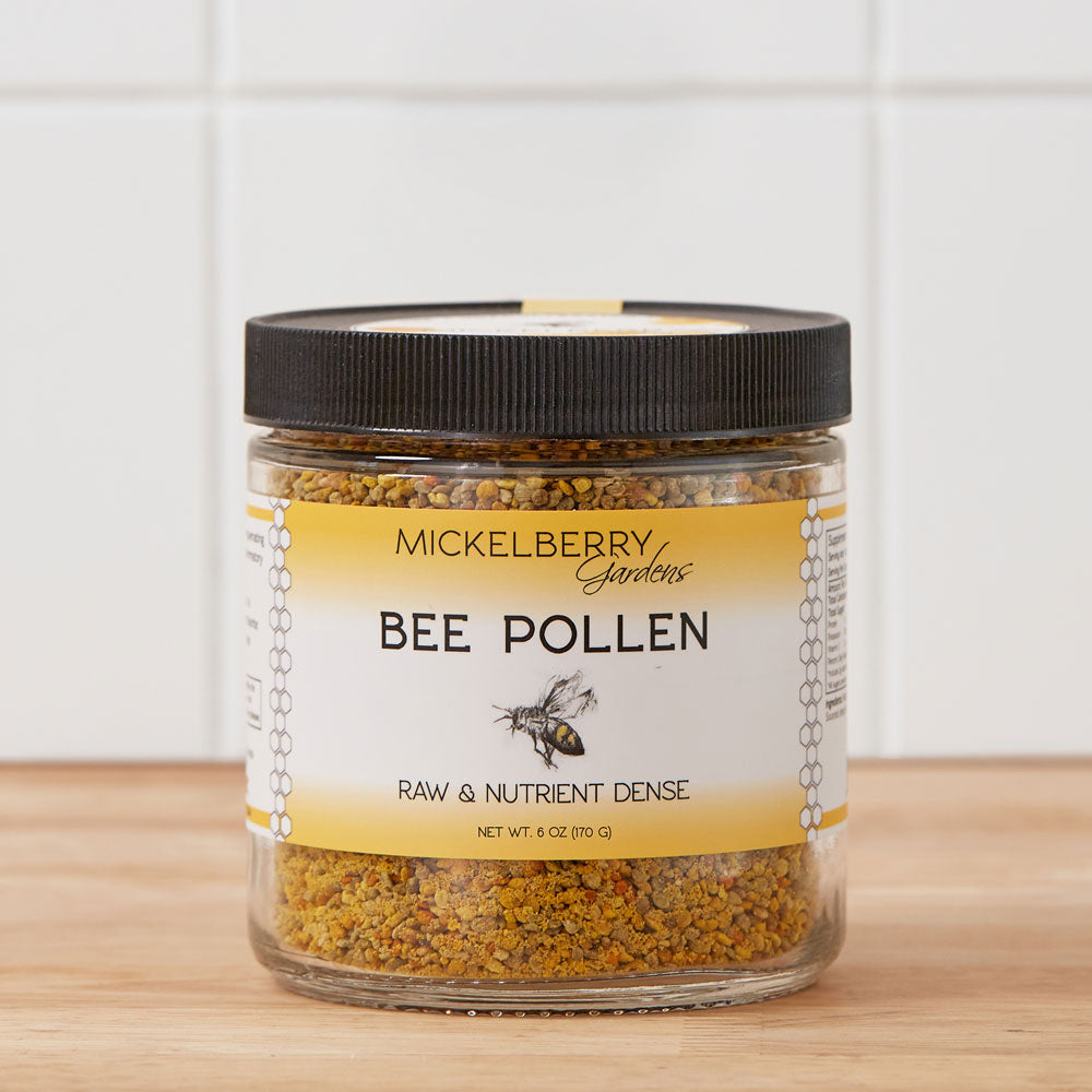 Jar of bee pollen from Mickelberry Gardens, made in the USA, showcasing golden bee pollen granules in a clear container.