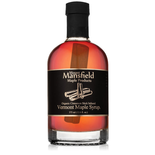 Organic cinnamon-infused Vermont maple syrup in a 375ml glass bottle by Mount Mansfield Maple Products.