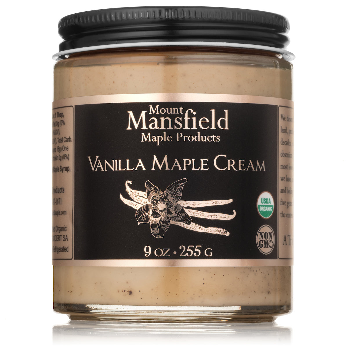 Creamy Vermont maple cream with vanilla infusion from Mount Mansfield Maple Products, displayed in a jar.