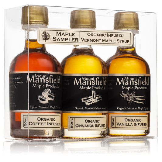 Three bottles of infused Vermont maple syrup from Mount Mansfield Maple Products in a sampler set.