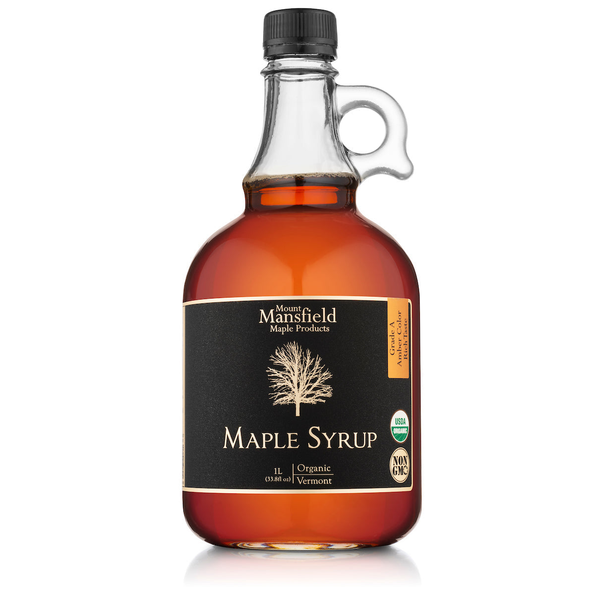 Organic Vermont maple syrup in a glass jug from Mount Mansfield Maple Products, featuring rich, amber-colored syrup.