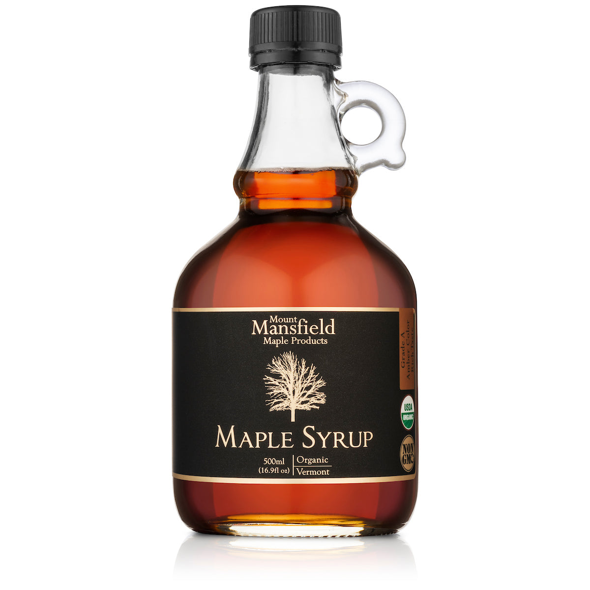 Organic Vermont Maple Syrup in a glass jug from Mount Mansfield Maple Products, showcasing rich amber syrup.