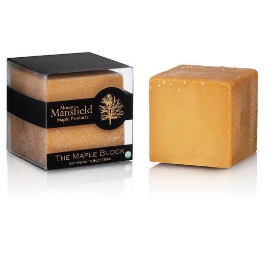 Maple candy called The Maple Block from Mount Mansfield Maple Products, showing golden, textured maple candy on a white background.