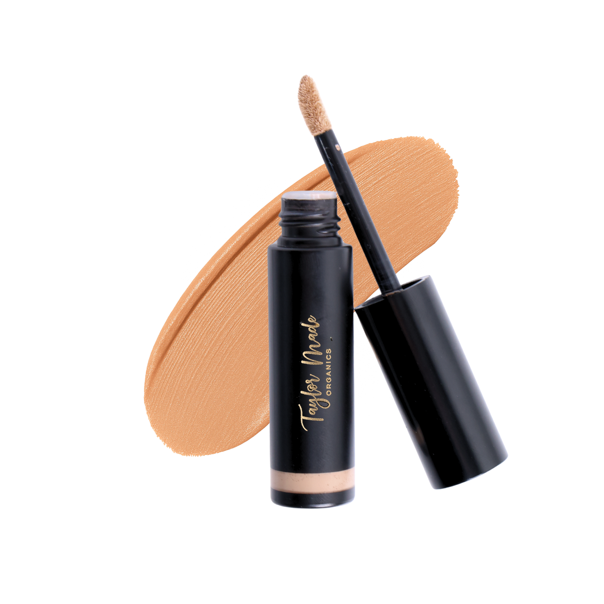 Swatch of Taylor Made Organics Maple Liquid Organic Concealer showing its smooth, natural finish and creamy texture.